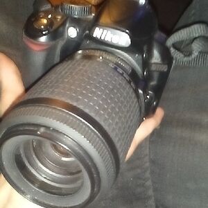 Nikon Black DSLR with Zoom Lens
